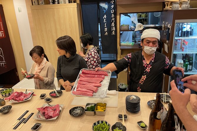 Tuna Cutting Show in Tokyo & Unlimited Sushi & Sake - Cultural Experience