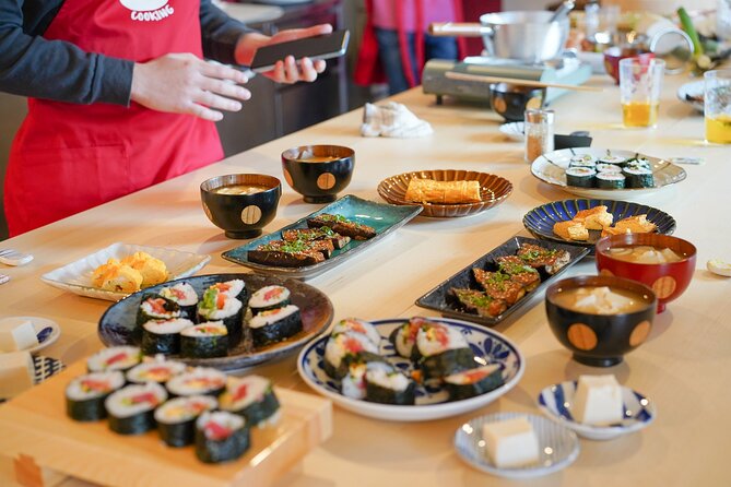 Sushi & Sake Tasting Cooking Class + Local Supermarket Visit - Key Points